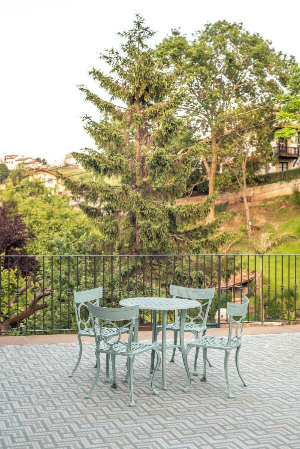 Apartamentos Boutique Fuente Real Комилас Екстериор снимка